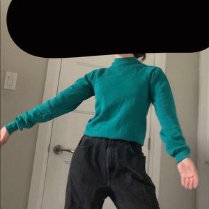 Vibrant low turtleneck sweater.